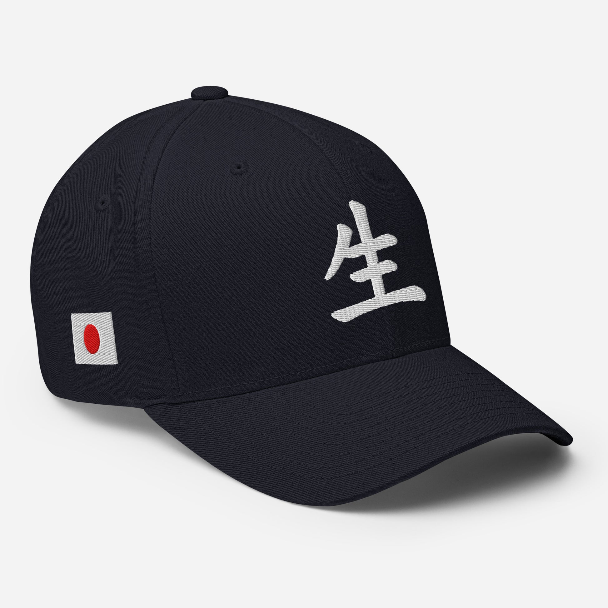 Dark Navy: "Japanse 'Life' Symbol Cap dark navy – wit geborduurd kanji-teken (生) op voorpaneel en Japanse vlag detail op zijkant, rechter vooraanzicht"